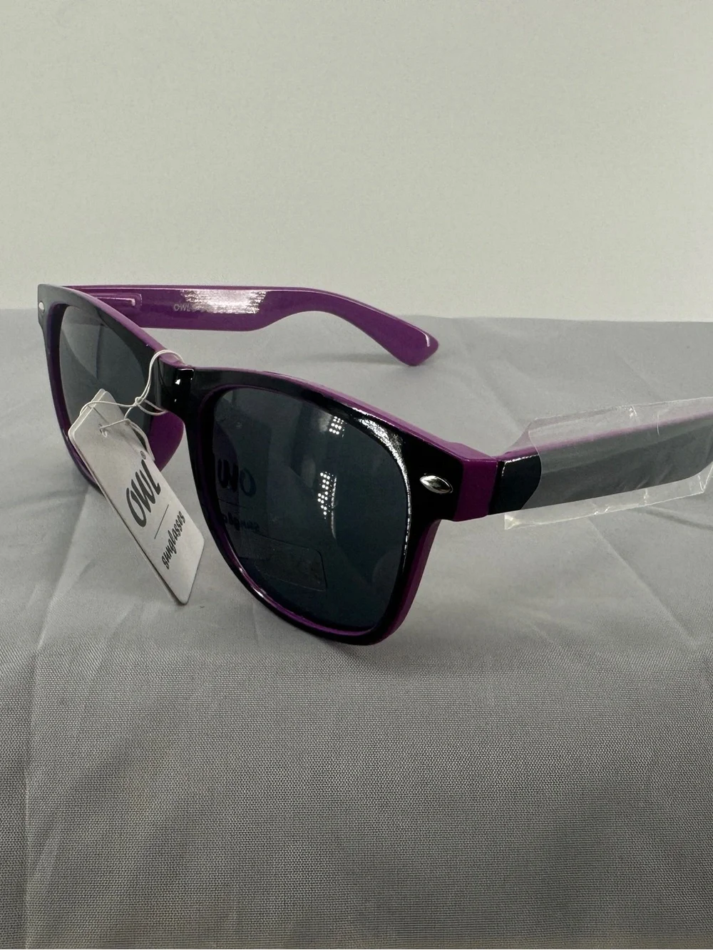Black and purple wayfarer sunglasses